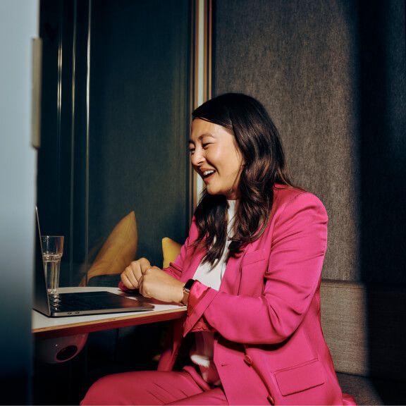 laughing consultant on video call in focus room laughing consultant on video call in focus room