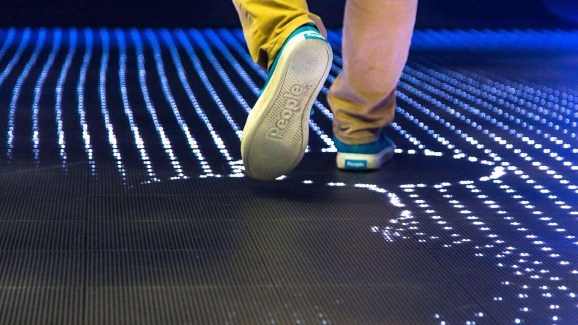 person walking in an IBM event installation person walking in an IBM event installation